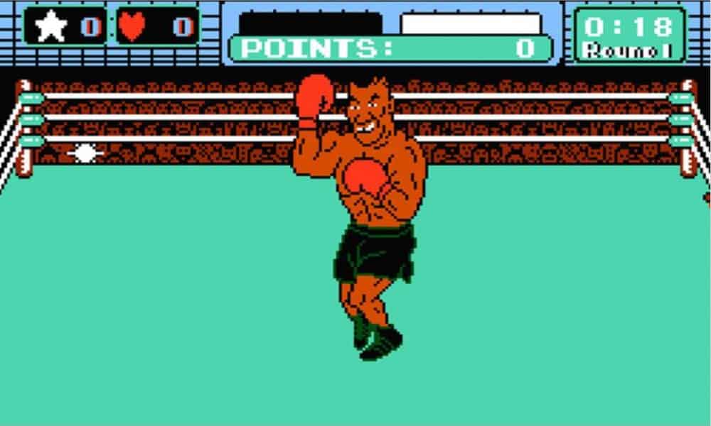 Virtual Mike Tyson smiling and flexing - Image from Mike Tyson's Punch-Out!! for the NES