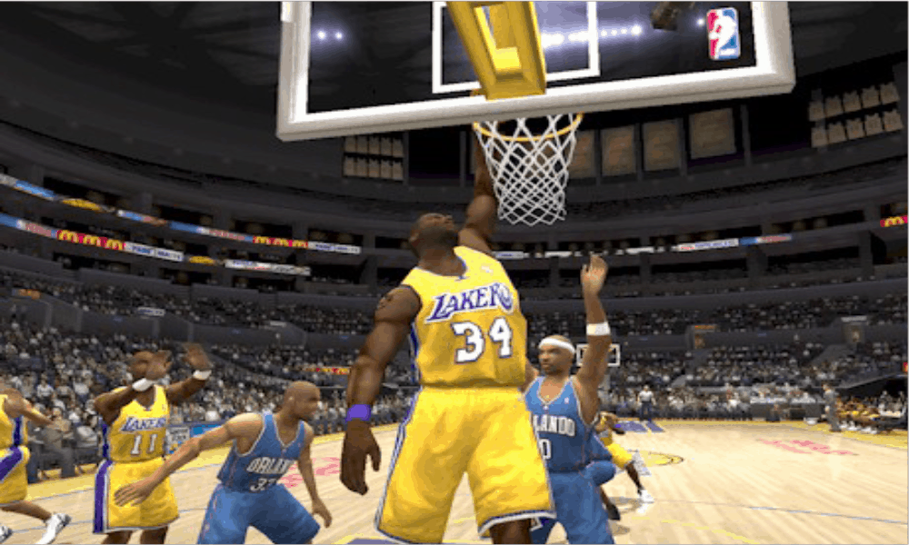 Virtual Shaquille O'Neal dunking the ball with one hand - Image from NBA Live 2004 for the PlayStation 2