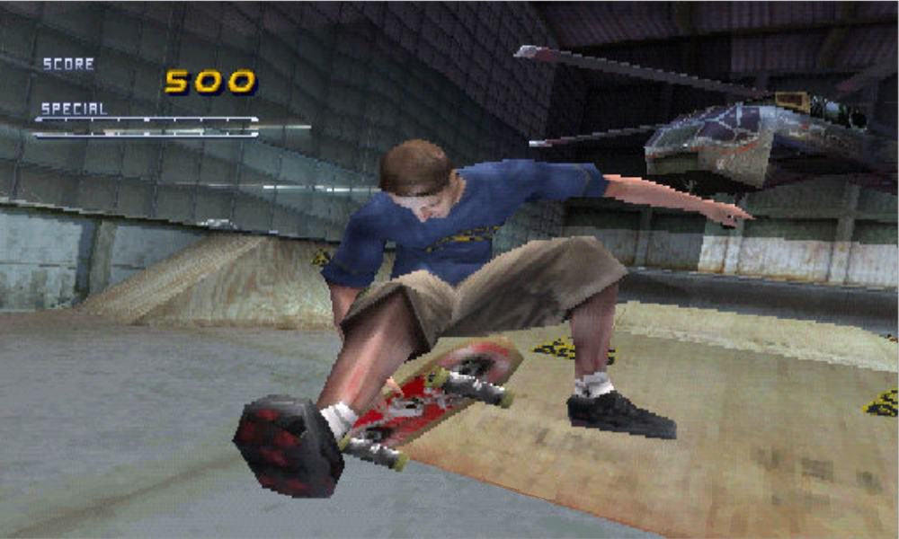 Virtual Tony Hawk performing a mid-air grab trick - Image from Tony Hawk's Pro Skater 2 for the PlayStation