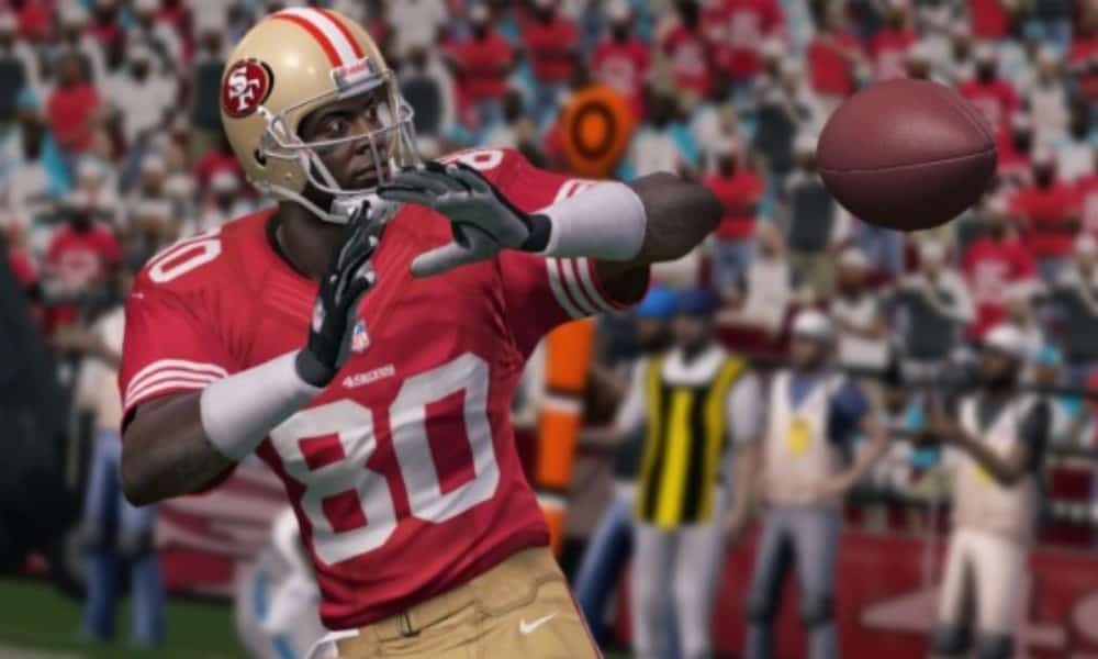 Virtual Jerry Rice prepared to catch the football that is about to reach him - Image from Madden NFL 25 for the Xbox 360