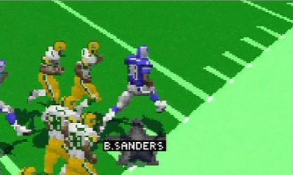 Virtual Barry Sanders running up the sideline past defenders - Image from Madden 98 for the PlayStation