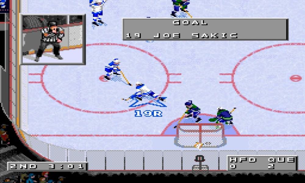 Virtual Joe Sakic celebrating after scoring a goal - Image from NHL 96 for the Sega Genesis
